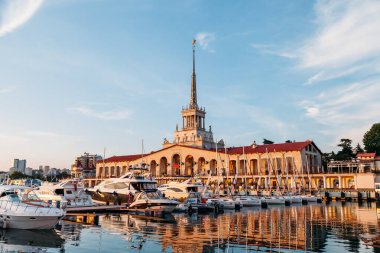 SOCHI, RUSSIA - June 5, 2018: Seaport with luxury yachts in Black sea at sunset