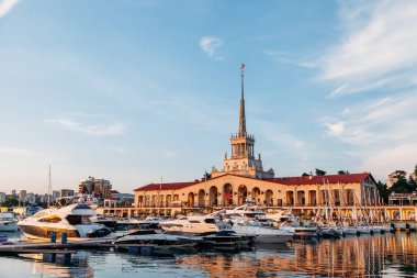 SOCHI, RUSSIA - June 5, 2018: Seaport with luxury yachts in Black sea at sunset