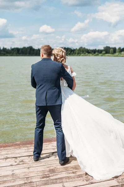 Bride Groom Embrace Pier Background Lake — Stock Photo, Image
