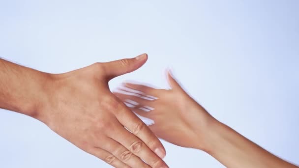 Closeup of hand shake of nude man and woman on white background isolated. Woman and man hands greeting — Stock Video