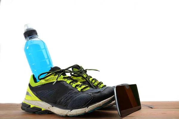 Sports drink on wooden table — Stock Photo, Image