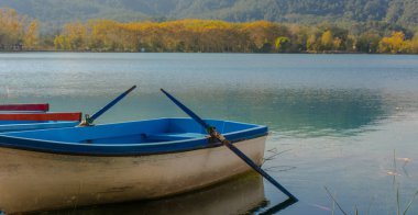 Lake of banyoles in Catalonia, Spain in the fall clipart