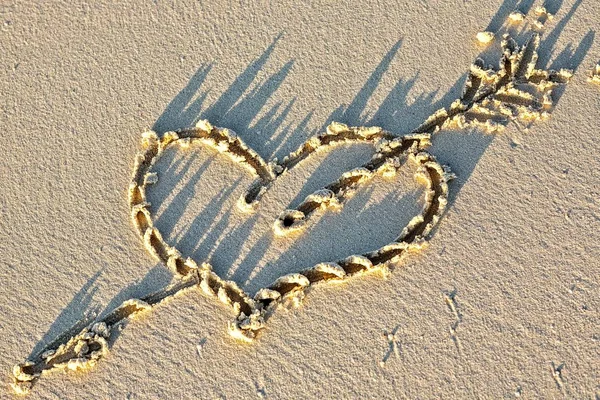 Heart on a sandy beach — Stock Photo, Image