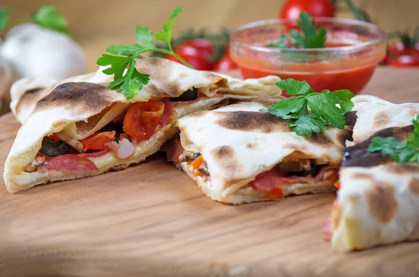 stock image Pizza calzone with close up