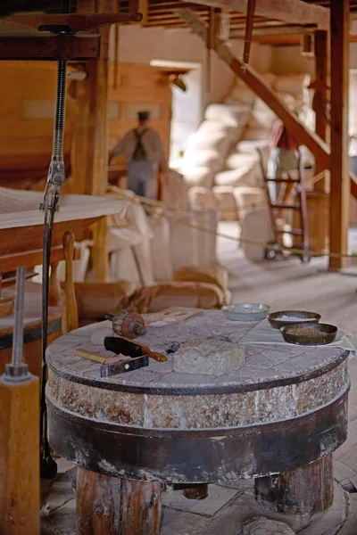 grinding wheel inside the mill, flour production in the 19th century in Canada.