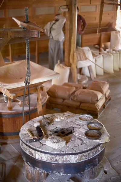 grinding wheel inside the mill, flour production in the 19th century in Canada.