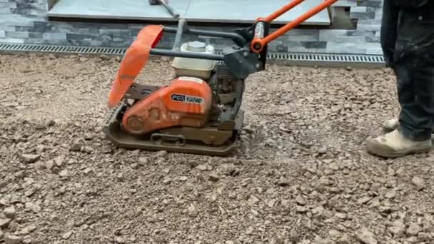 Cardiff Wales February 2020 Petrol Driven Tamping Machine Being Used — Stock Video