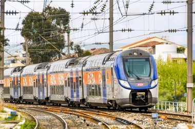 ST RAPHAEL, FRANCE - APRIL 2019: Close up of a SNCF French railways train arriving in St Raphael on the French Riviera.