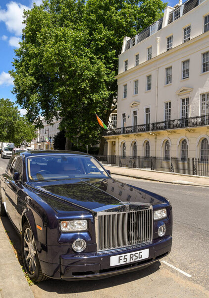 LONDON, ENGLAND - JULY 2018: Rolls Royce luxury motor car parked on a street in central London