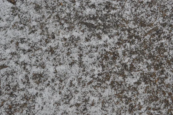 Différentes textures de neige sur les dalles de béton — Photo