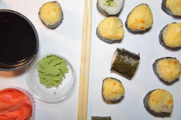 Different sushi sets from a japanese restaurant on the backgroun — 스톡 사진