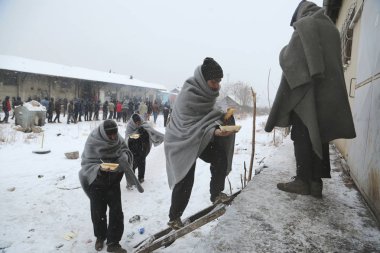 Belgrad 'da kışın göçmenler