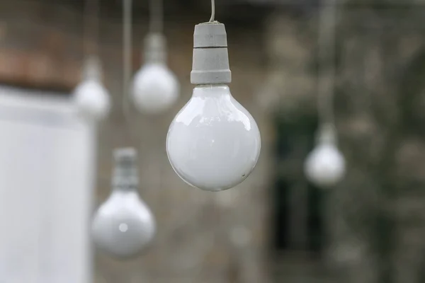 Light bulb design on cable — Stock Photo, Image