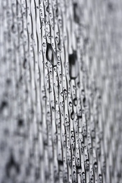 Water drops on metal surface — Stock Photo, Image