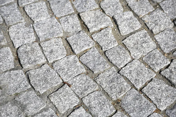 Texture of old cubic cobblestone — Stock Photo, Image