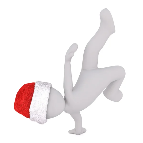 Atletisk figur i Santa hatt gör handstående — Stockfoto