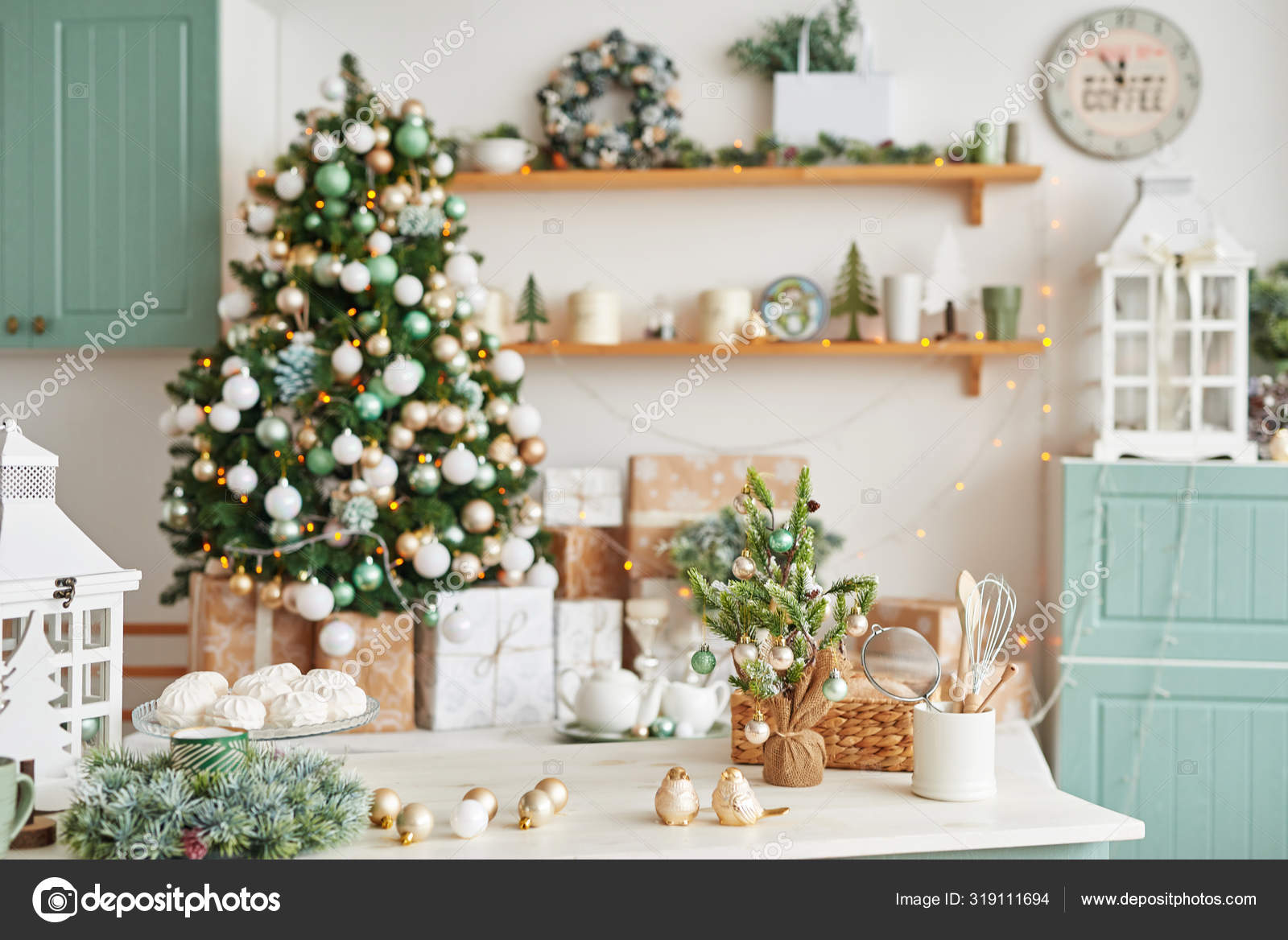 Interior light kitchen with christmas decor and tree. Turquoise-colored  kitchen in classic style. Christmas in the kitchen. Bright kitchen in mint  and white shades with Christmas. Stock Photo by ©yarovoy_aleksandr 319116004