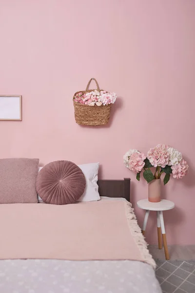 Interior bedroom furniture concept. Cozy Pink Bedroom corner. Co