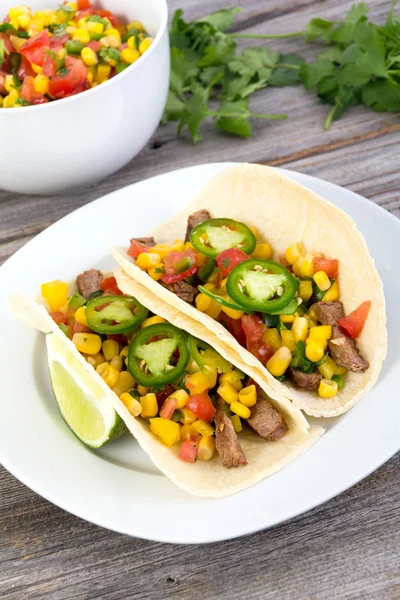 Beef corn soft taco on rustic wood table — Stock Photo, Image