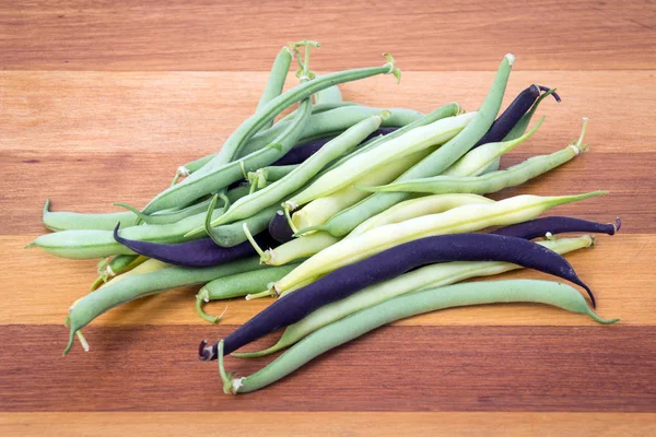 bunch of harvested bean three varieties on table