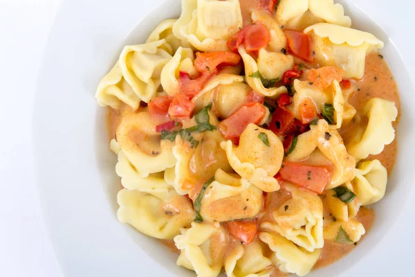 Tortellinis pasta in tomato sauce — Stock Photo, Image
