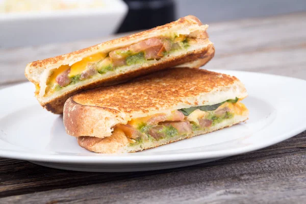 Pesto tomato grilled cheese sandwich — Stock Photo, Image