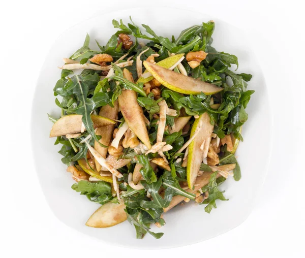 Arugula pear and nut salad — Stock Photo, Image