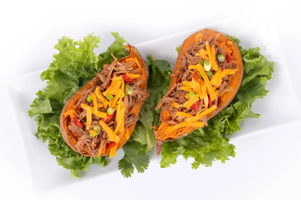 Delicious spicy pulled pork stuffed sweet potato dish — 스톡 사진