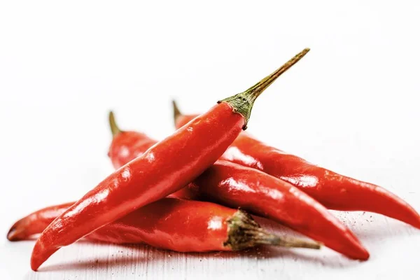 Red Chili Peppers On White — Stock Photo, Image