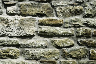 Duvarcılığın dokusu, 10. yüzyılda antik bir tapınağın taş duvarının bir parçası, arka plan, arka plan