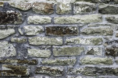 Duvarcılığın dokusu, 10. yüzyılda antik bir tapınağın taş duvarının bir parçası, arka plan, arka plan