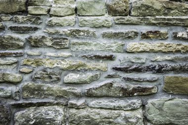 Duvarcılığın dokusu, 10. yüzyılda antik bir tapınağın taş duvarının bir parçası, arka plan, arka plan