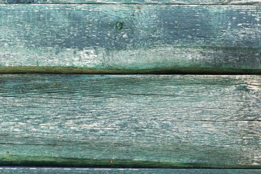 Arkaplan dokusu arka planı için mavi boyayla boyanmış mavi çatallı tahtalar.