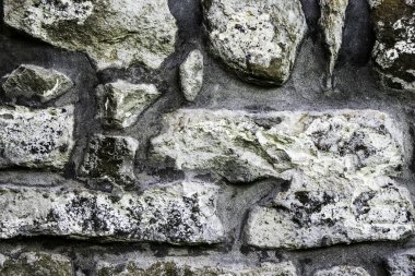 Duvarcılığın dokusu, 10. yüzyılda antik bir tapınağın taş duvarının bir parçası, arka plan, arka plan