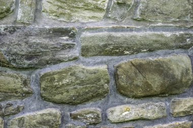 Duvarcılığın dokusu, 10. yüzyılda antik bir tapınağın taş duvarının bir parçası, arka plan, arka plan