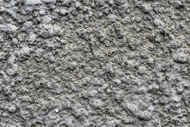 Kürk mantonun altına dokunun arka planı için yapıştırılmış taş duvar.