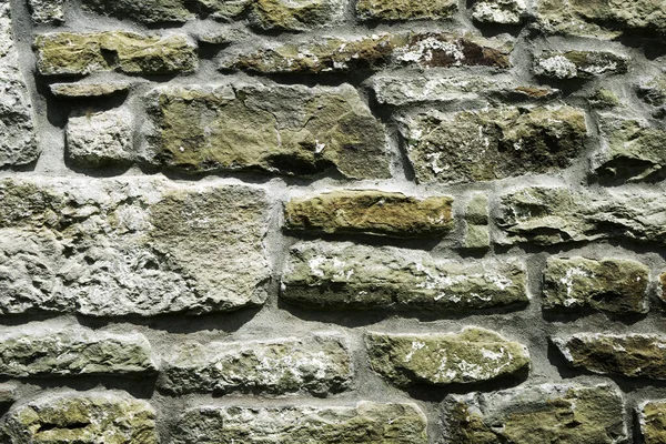 石造の質感10世紀の古代寺院の石壁の断片背景背景 — ストック写真