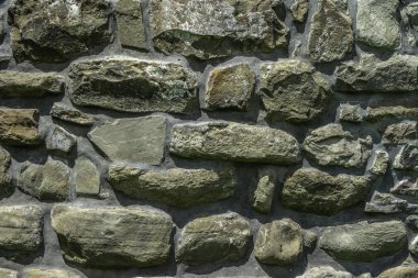 Duvarcılığın dokusu, 10. yüzyılda antik bir tapınağın taş duvarının bir parçası, arka plan, arka plan