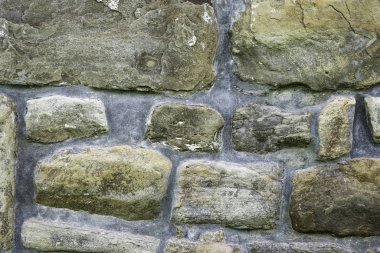 Duvarcılığın dokusu, 10. yüzyılda antik bir tapınağın taş duvarının bir parçası, arka plan, arka plan