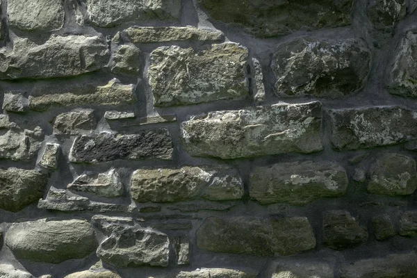 Struttura di muratura, un frammento di un muro di pietra di un tempio antico del X secolo, sfondo, sfondo — Foto Stock