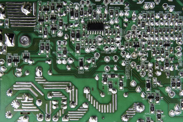 The electrical board with soldered parts for backdrop background — Stock Photo, Image