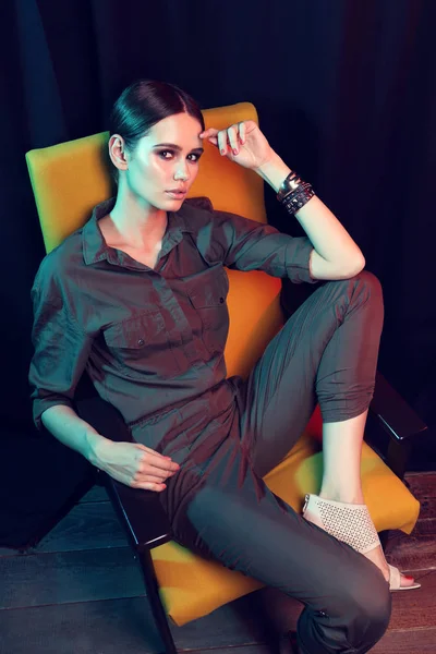 Elegant woman in armchair — Stock Photo, Image