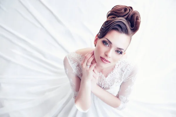 young bride in white dress