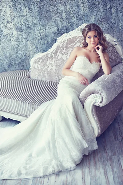 bride in antique armchair