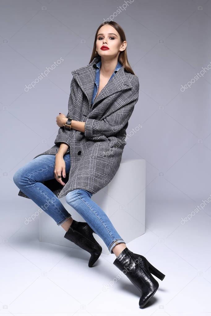 woman in Grey coat