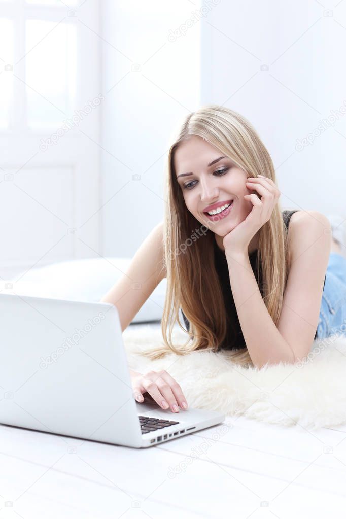 young woman using laptop 