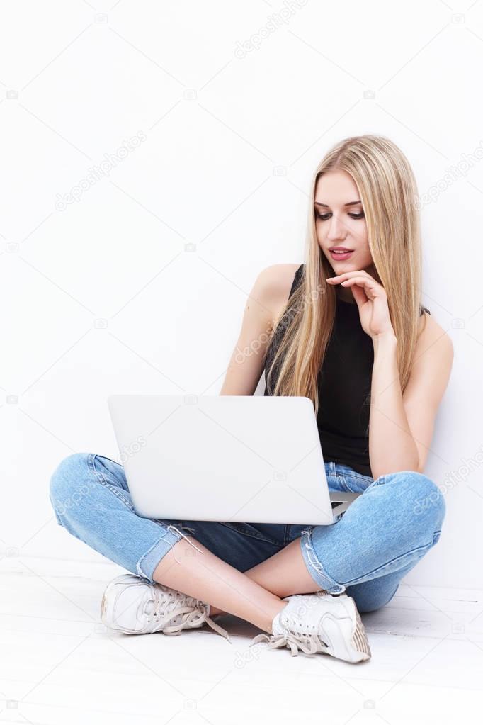woman with laptop at home