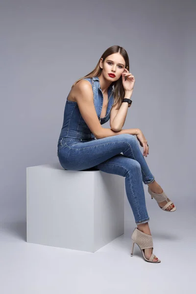 Elegant woman in skinny overall — Stock Photo, Image