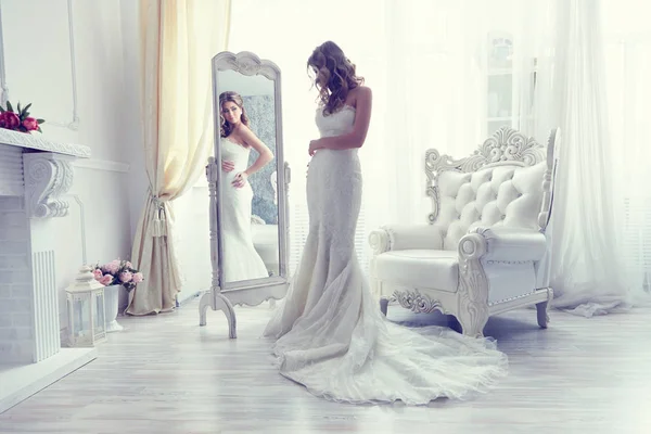 bride near antique armchair