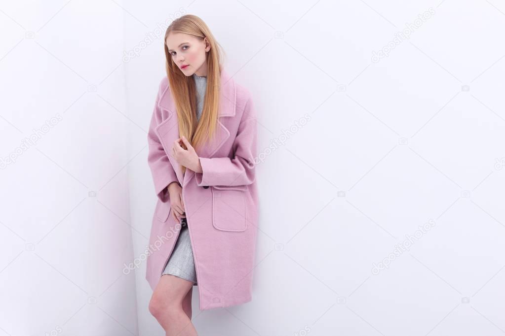 woman in pink coat